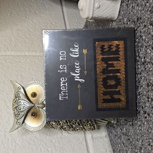 "There is no place like home" wall plaque
